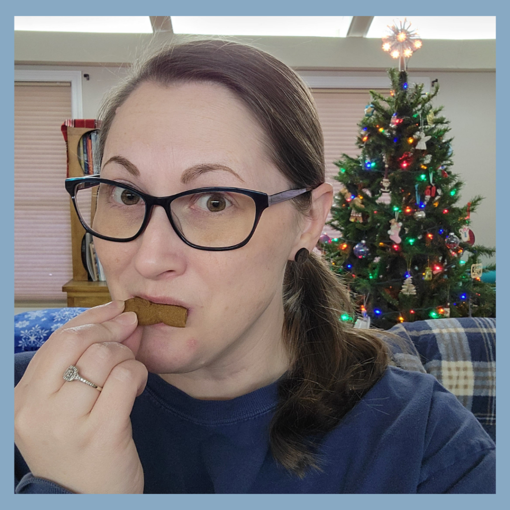 Rachel D. Baker enjoying a cookie at Christmas.